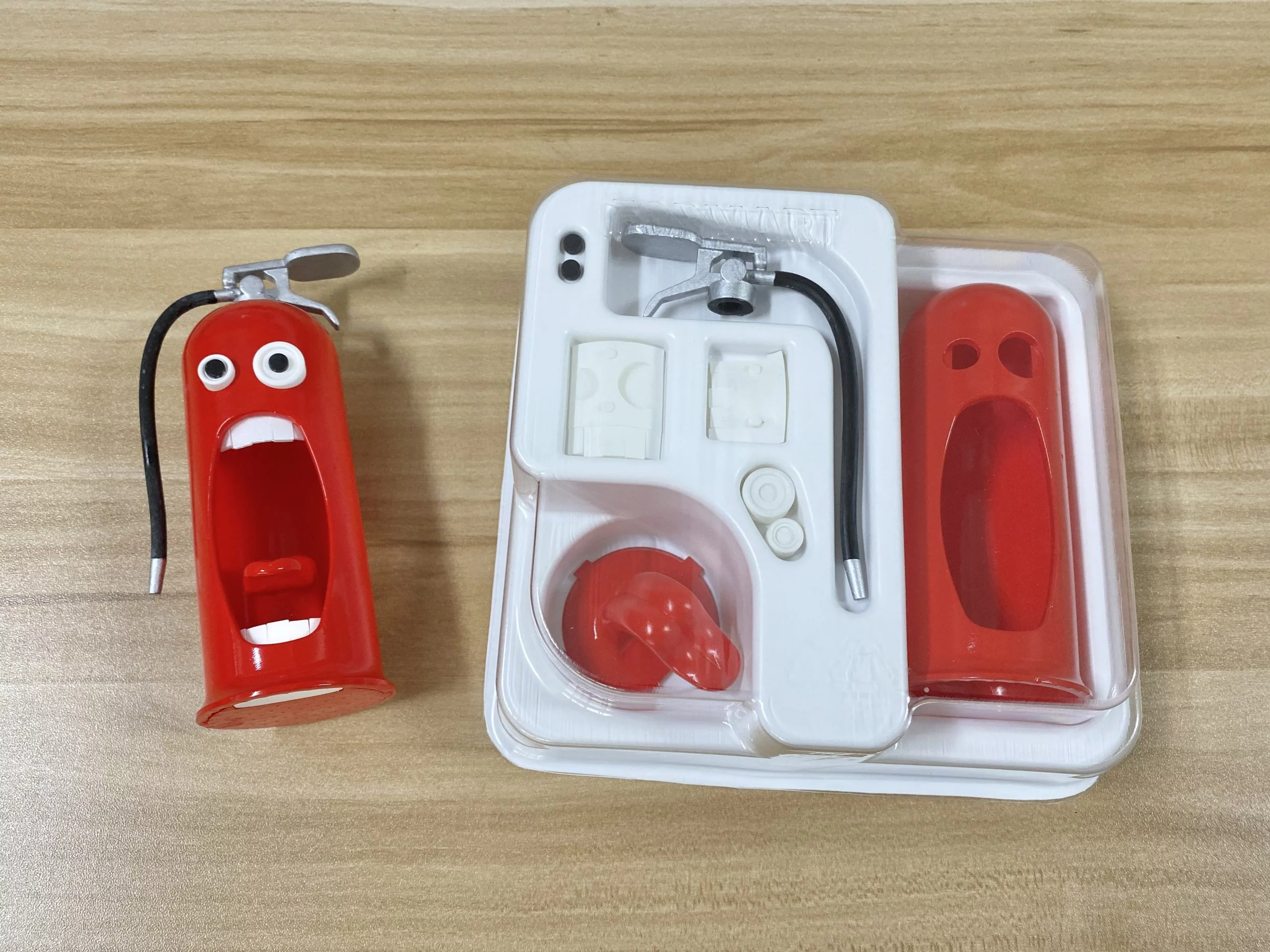 Fire extinguisher doll & the packaging