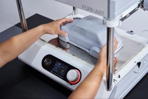 Demonstration of the first step, preparing a mold for vacuum forming machine